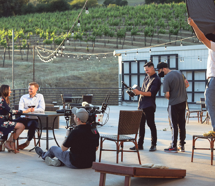 pour winery marketing video production team filming at sunset