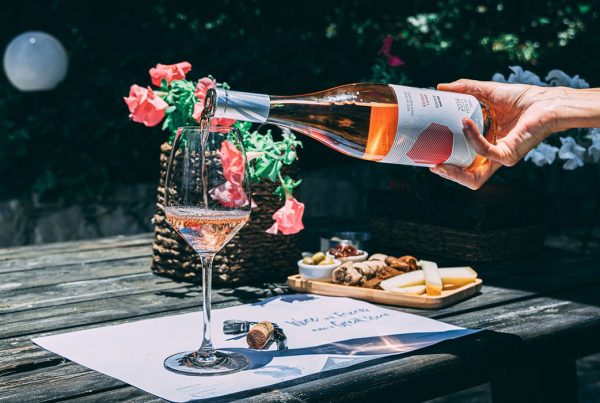 family owned winery pouring wine advertisement