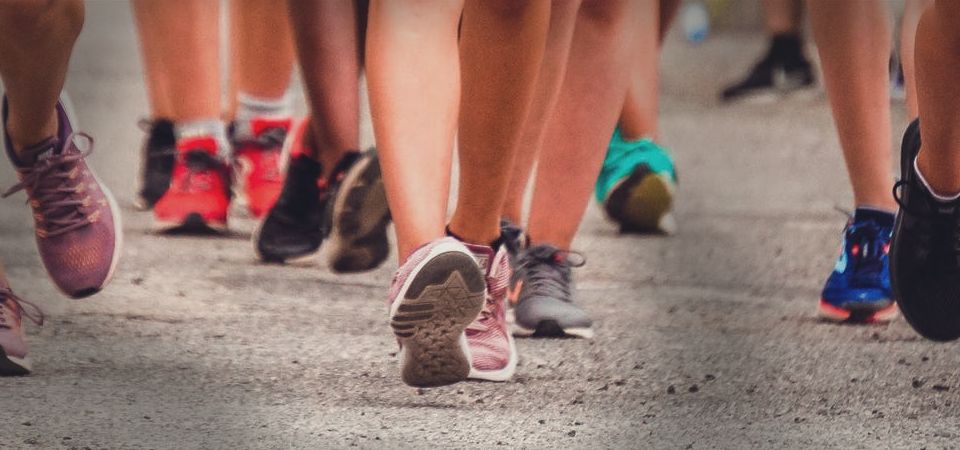 women in running shoes